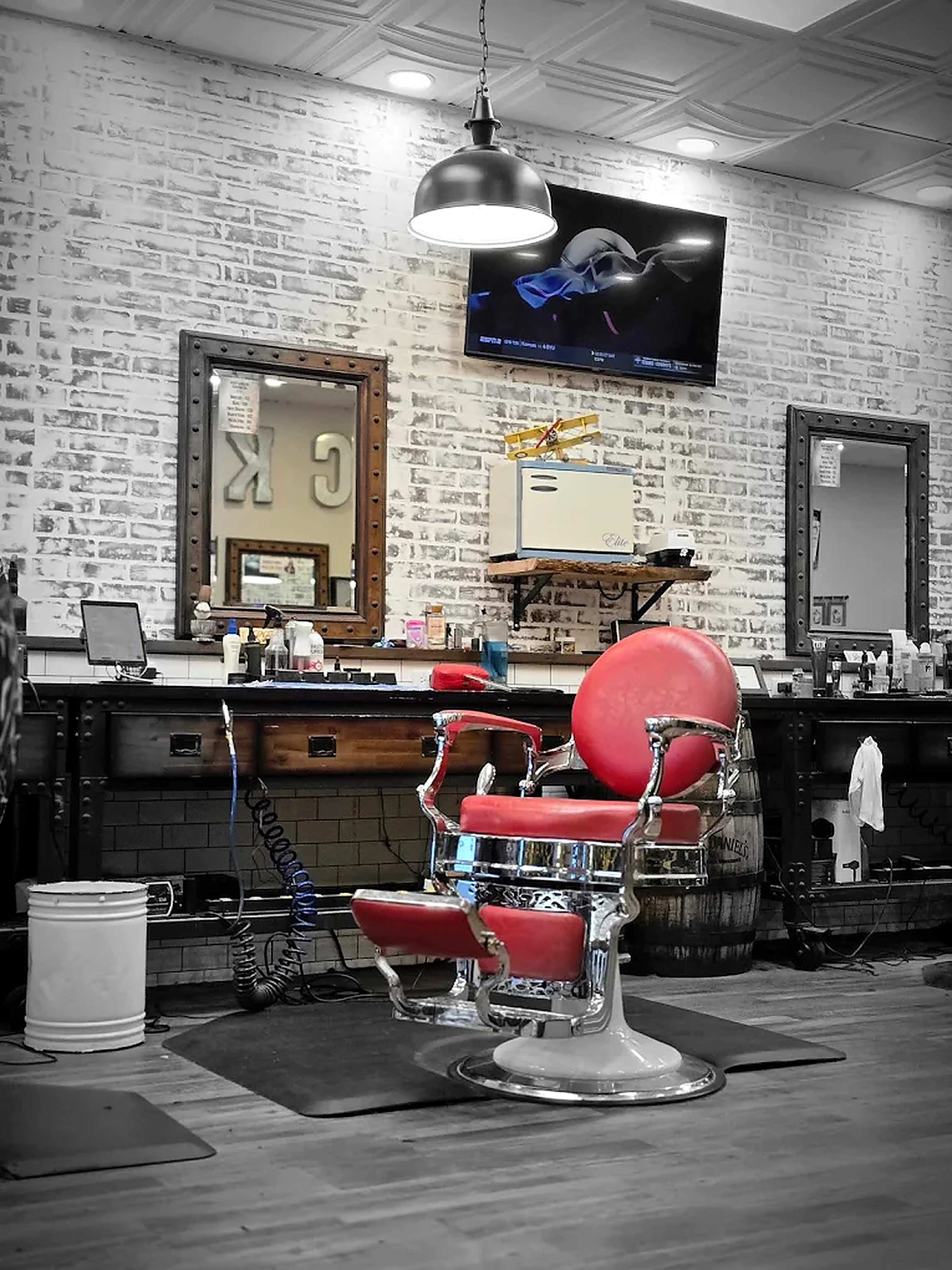 Barber chair in the Barrel & Blade shop interior